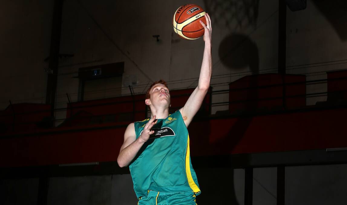 Wollongong's Angus Glover, 16, has been selected for the Australian under-19 basketball squad. Picture: KIRK GILMOUR