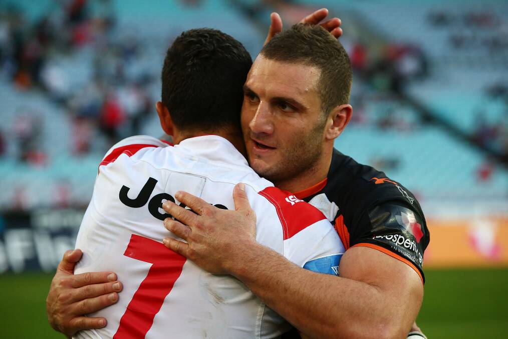 Benji Marshall and Robbie Farah after the Dragons' 28-12 win on Sunday. Picture: GETTY IMAGES
