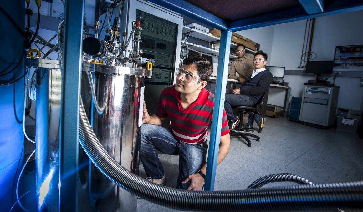 Cutting edge: UOW researcher Dipak Patel checks out the ground-breaking magnet cooling system that could cut MRI scanning costs.Picture: PAUL JONES