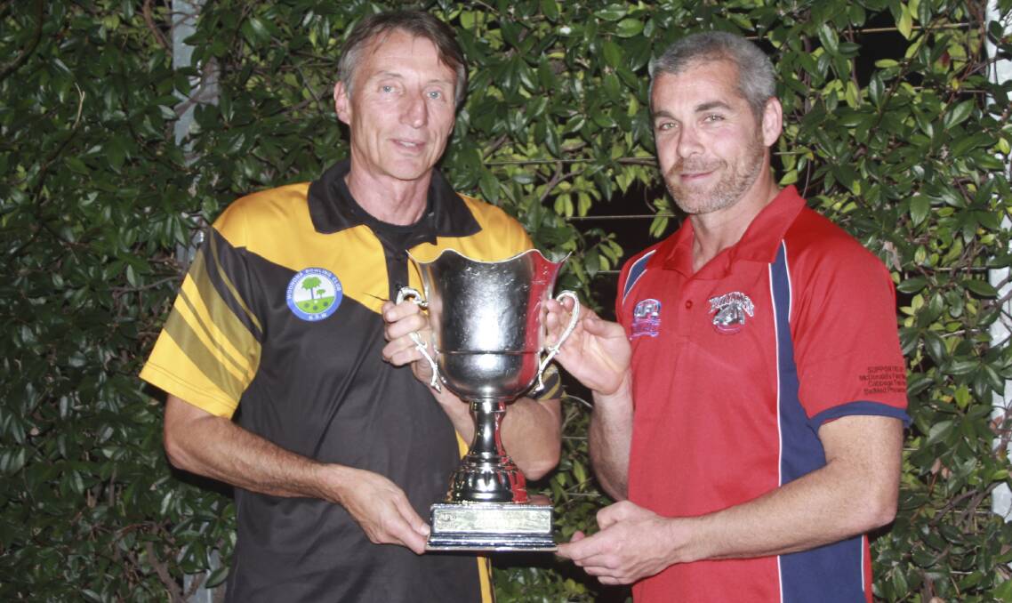 Northern Districts coach Leigh Forsyth and Wollongong coach Lee Murray hold the premiership trophy up for grabs in the grand final. Picture: SHAREN BALAZIC