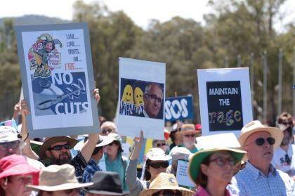 Protesters rally against ABC budget cuts outside Parliament House on Tuesday. Photo: Andrew Meares