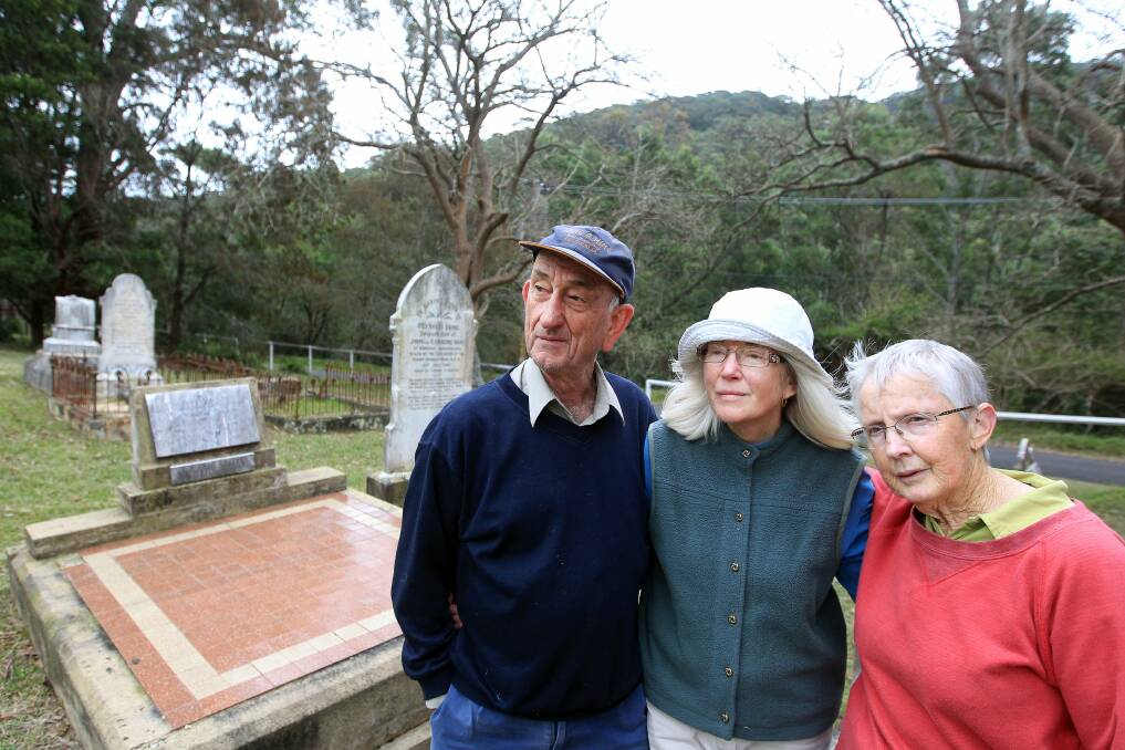 Col and Jennifer Meharg and Elizabeth Roberts at Windy Gully Cemetery ahead of  the 96 Candles ceremony to mark the 1902 Mt Kembla mine disaster. Picture: SYLVIA LIBER
