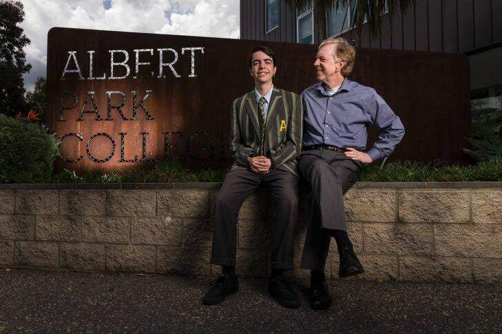 Timothy Norris and his 15-year-old son Nicholas, who moved from an independent school to Albert Park College. Port Melbourne.  Saturday November 18th, 2017. Photo: Daniel Pockett