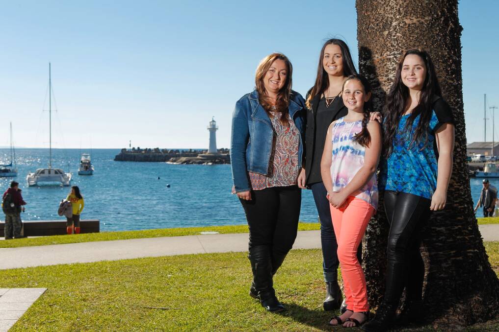 West Wollongong mother Heidi Naulty with her daughters Maddison, 18, Charlotte, 11, and Georgia, 16. Picture: CHRISTOPHER CHAN