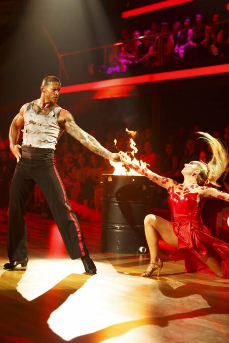 Matt Cooper performs the Paso Doble with partner Masha Belash to the Rolling Stones' Sympathy for the Devil.