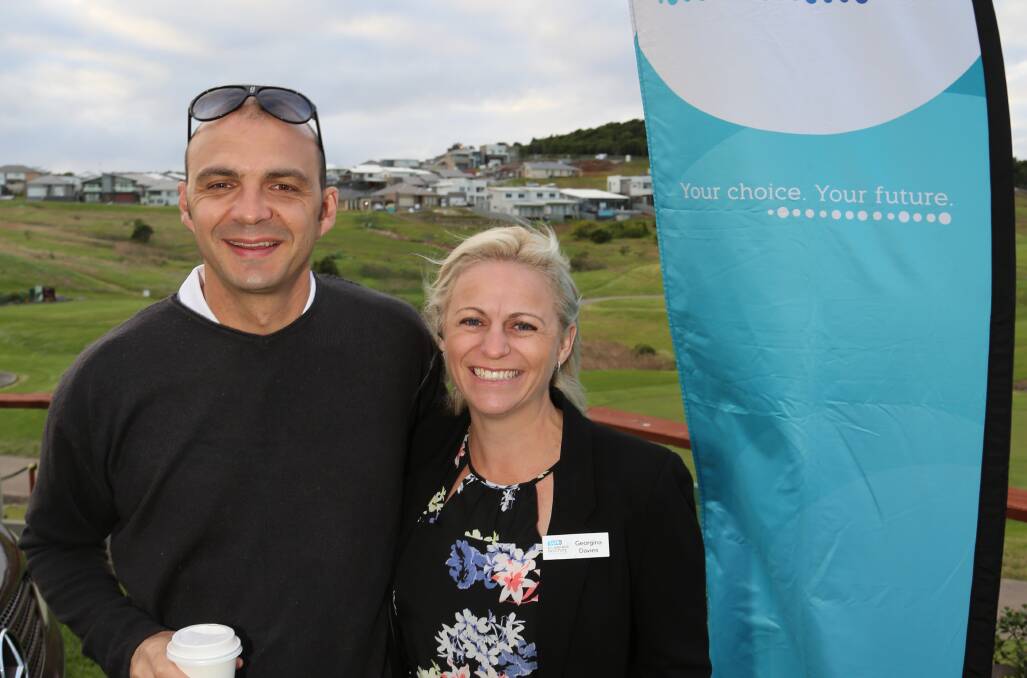 Novotel Wollongong Northbeach general manager Steve Savic with TAFE Illawarra events teacher Georgina Davies at Friday's record-breaking golf day for Angels at Work. Picture: GREG ELLIS
