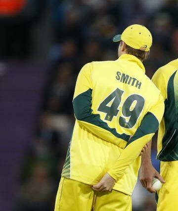 Steve Smith has words of advice for Shane Watson during the one day match against England in Southampton last week. Photo: Alastair Grant