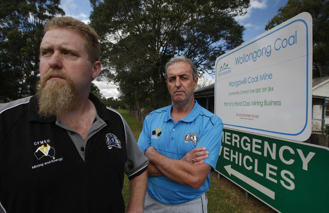 Unhappy officials Bob Timbs, CFMEU Southern Vice President Mining and Energy with Steve Drain, Wongawilli Lodge President outside the mines entry. Picture: ANDY ZAKELI