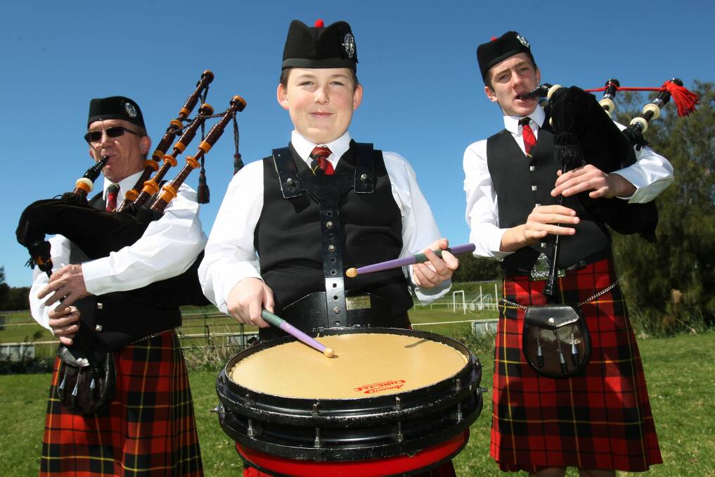 Pipers Rob Mackenzie, left, and Seamus King, right, with drummer Matthew Cox  prepare for the Illawarra Scottish Games at Dandaloo Sports Oval on October 19. Picture: GREG TOTMAN