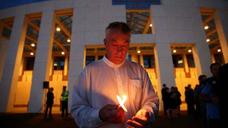 Andrew Stojanovski during the candlelight vigil . Photo: Alex Ellinghausen