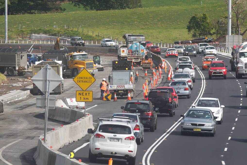 A section of the Princes Highway damaged by heavy rain is fixed. Picture: CHRISTOPHER CHAN