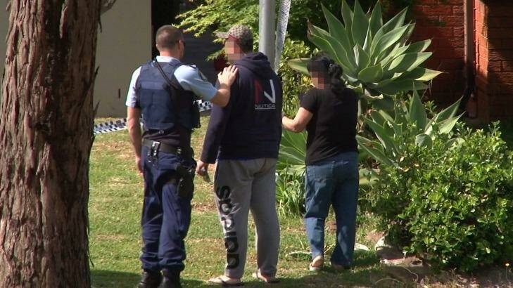 A distraught friend or relative is comforted at the scene in Sturt Avenue. Photo: TNV News