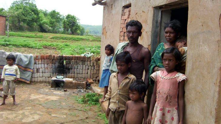 Pusanidevi Manjhi, pictured with husband Gooda and their children, was accused of being a witch by a landowner in Palani, India. Photo: The Washington Post/Rama Lakshmi