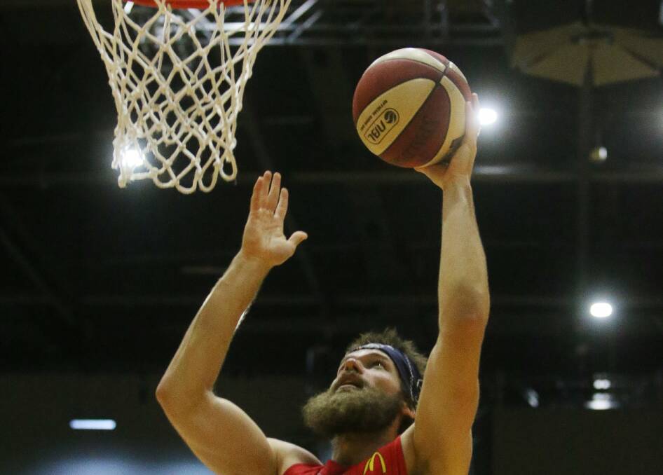 Larry Davidson marked his first game in the startling line-up this season by contributing 12 points and nine rebounds for the Hawks. Picture: ROBERT PEET