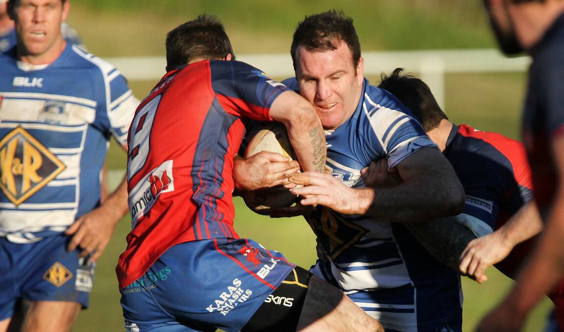 Thirroul's Aaron Beath muscles up to test Wests' defence on Sunday. Picture: GREG TOTMAN