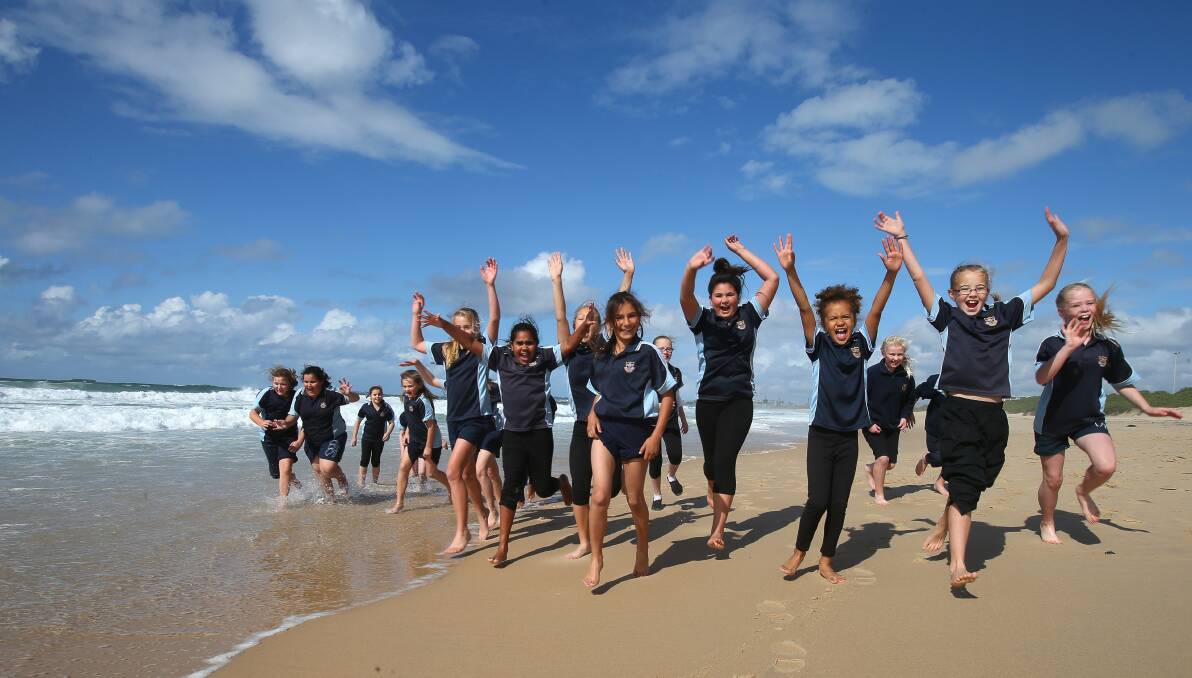 Bourke Public School students take time out from their Southern Stars rehearsal to visit City Beach.Picture: KIRK GILMOUR
