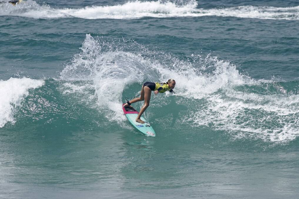 Top performance: Kiara Meredith cuts back on a wave in her fine runner-up placing in the under 16s division of the Summer Surf Series event at North Cronulla beach on Sunday.
