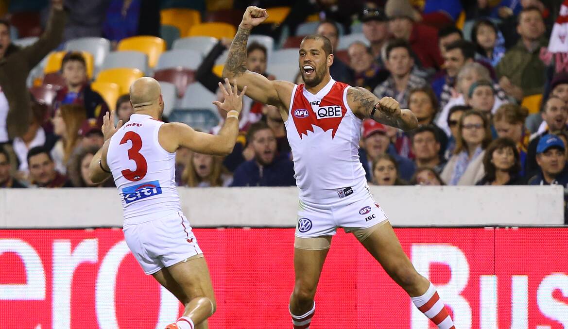 Lance Franklin of the Swans celebrates a goal against the Lions at the Gabba on Sunday. Picture: GETTY IMAGES
