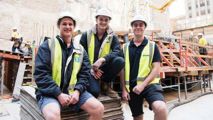 Will Gulliford, Tom Gulliford and Matt Ventrella have all been taken on as apprentices with Hutchinson Builders.  Photo: James Brickwood