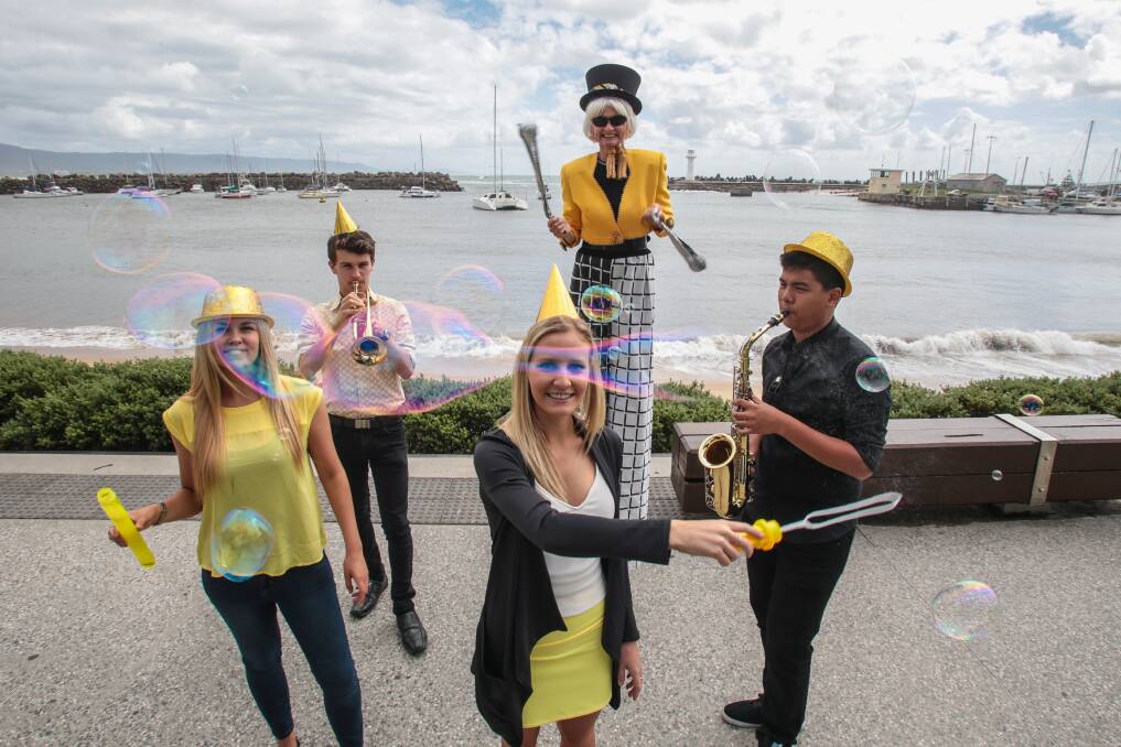 Brittany Vickers (left), Jack Purdon, Brooke Jeal, Libby Bloxham and Charles Ho promote Wollongong’s New Year’s Eve celebrations at Belmore Basin. Picture: ADAM McLEAN