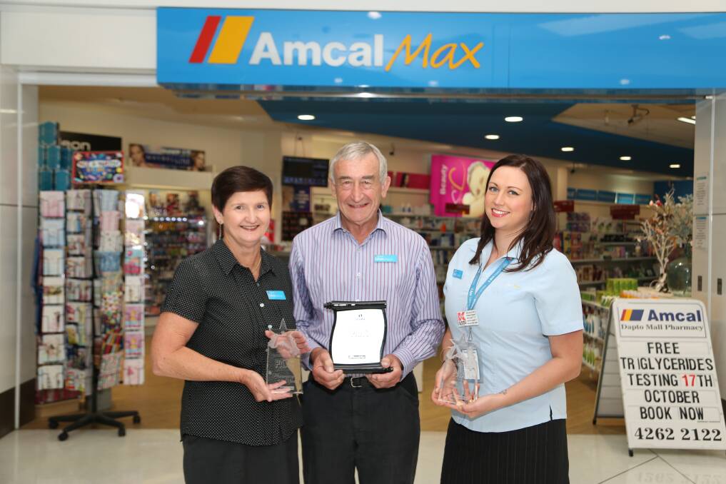 Top shop: Anne McQueen, Peter Abba and Sarah Burton of Amcal Max Dapto are delighted with their two national awards. Picture: GREG ELLIS
