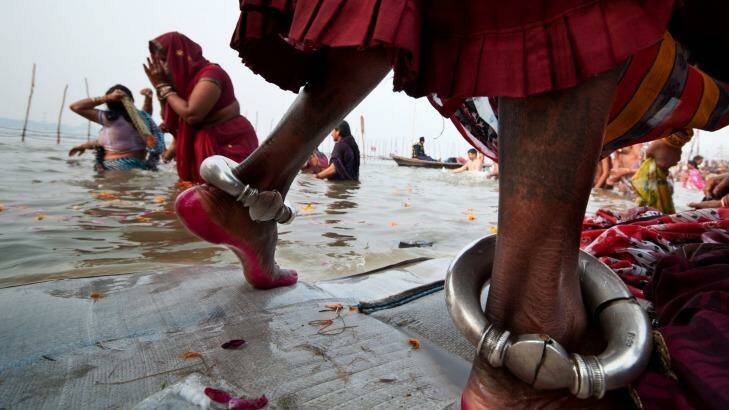 Pilgrims bathe at the confluence of the Ganga, Yamnuna and  Saraswati rivers in Allahabad.  Photo: Subir Basak