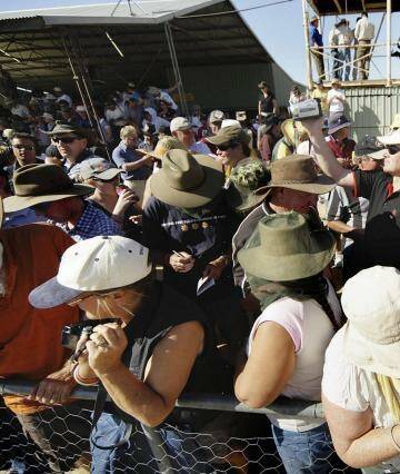 The tiny outback town of Birdsville swells to thousands during the annual races.  