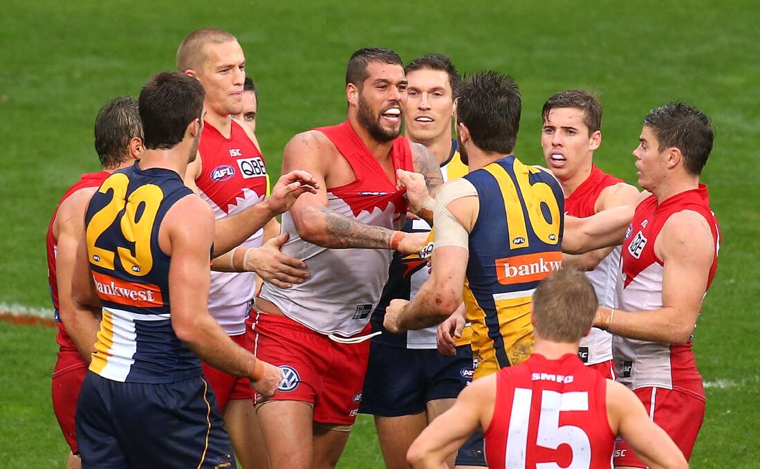 Sydney Swans' Lance Franklin remonstrates with West Coast Eagles' Eric Mackenzie in Perth on Sunday. Picture: GETTY IMAGES