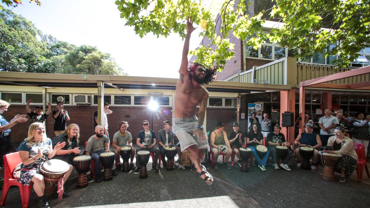 Sound production student Oliver Denning dances to African drumming at Wollongong TAFE.Picture: ADAM McLEAN