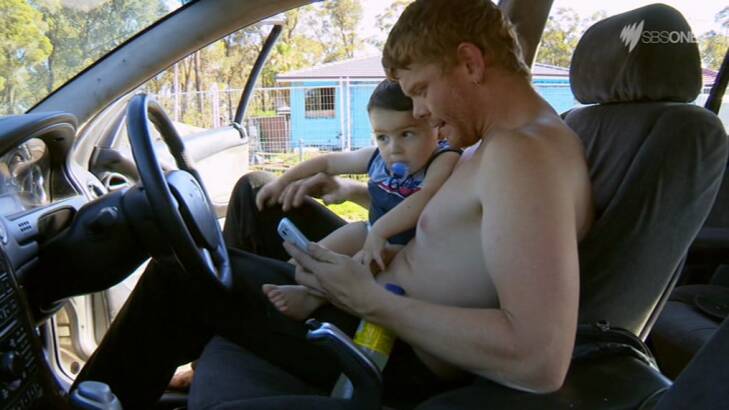"Daddy wanted to see you yesterday but mummy wouldn't let him": Corey and son Liam. Photo: SBS