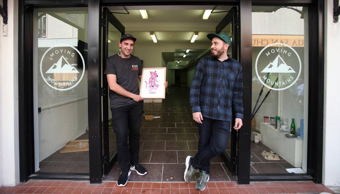 Non-traditional: Artist Bafcat, also known as Mitch Guerin, and Simon Grant of the Verb Syndicate outside the new art gallery.Picture: KIRK GILMOUR
