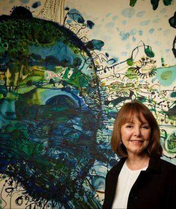 Artist biographer: Darleen Bungey (pictured alongside John Olsen's <i>Five bells</i> 1963 at the Art Gallery of NSW) was a good match for her larger-than-life subject. Photo: Wolter Peeters