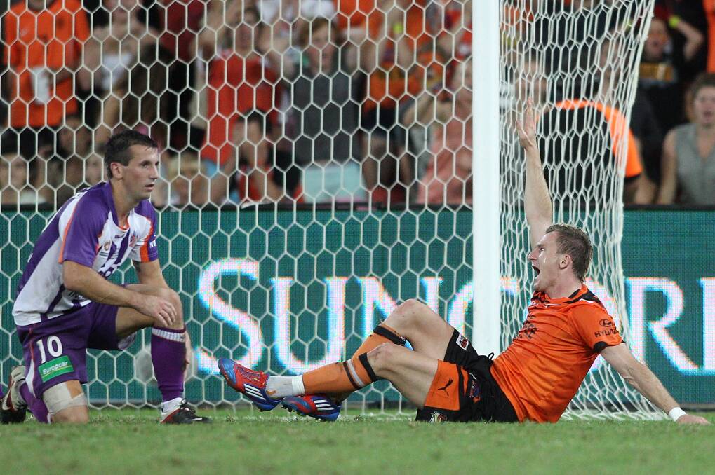Flashback: Besart Berisha appeals for, and gets, the vital penalty as Liam Miller looks on in the 2012 grand final. Picture: GETTY IMAGES