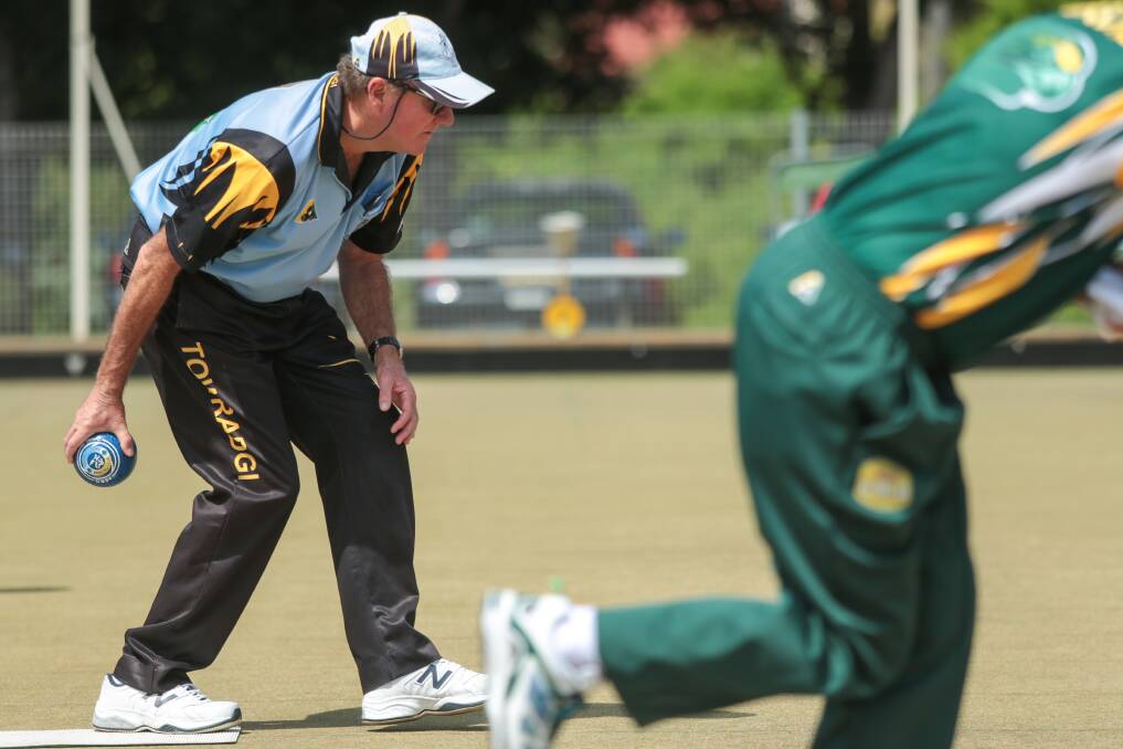 Towradgi Park's Ray Parkes plays his bowl during the clash against Figgy Bowlo earlier this season. Towradgi had their first Grade 1 win of the season, beating the previously undefeated Albion Park in round four. Picture: ADAM McLEAN