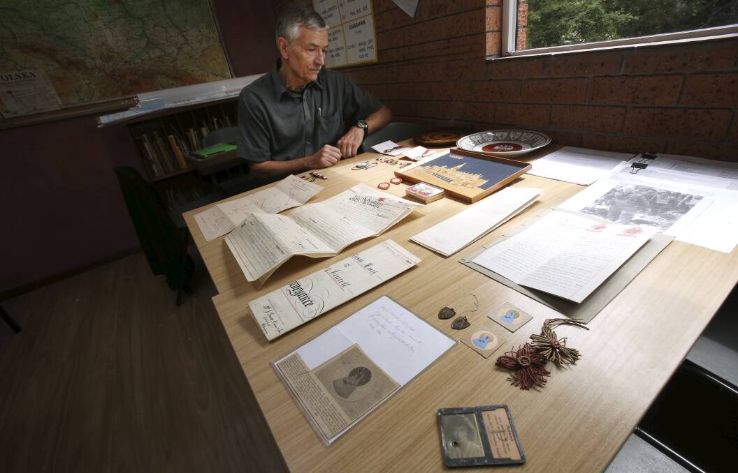 Polish Australian Historical Group head Andrew Krajewski with some of the items collected for a planned Polish museum in Wollongong. Picture: KIRK GILMOUR