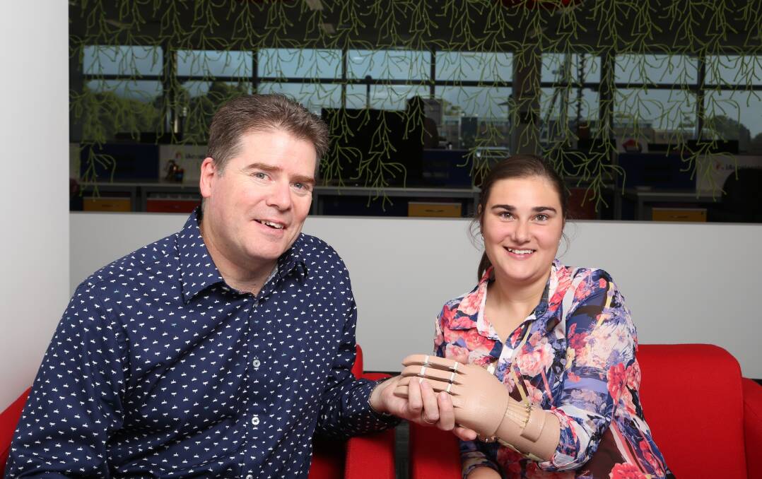 Breakthrough: Ben Roberts has changed Eliza Warner's life forever thanks to a 3D printer he used to make a prosthetic hand. Picture: GREG ELLIS