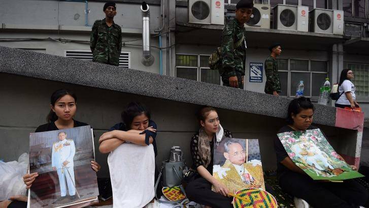 Crowds gather to mourn following the death of King Bhumibol Adulyadej. Photo: Kate Geraghty
