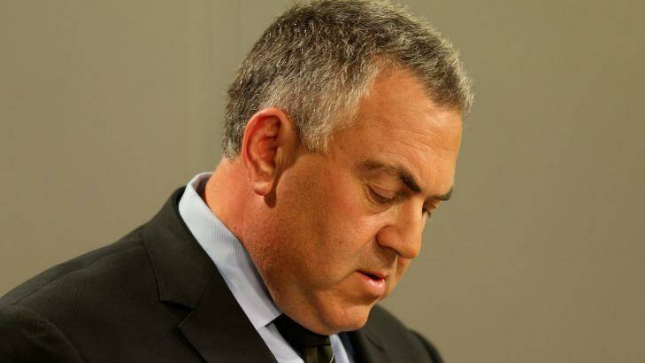 Tough times ahead: Joe Hockey plans a national conversation with Australians in 2015. Photo: Kate Geraghty