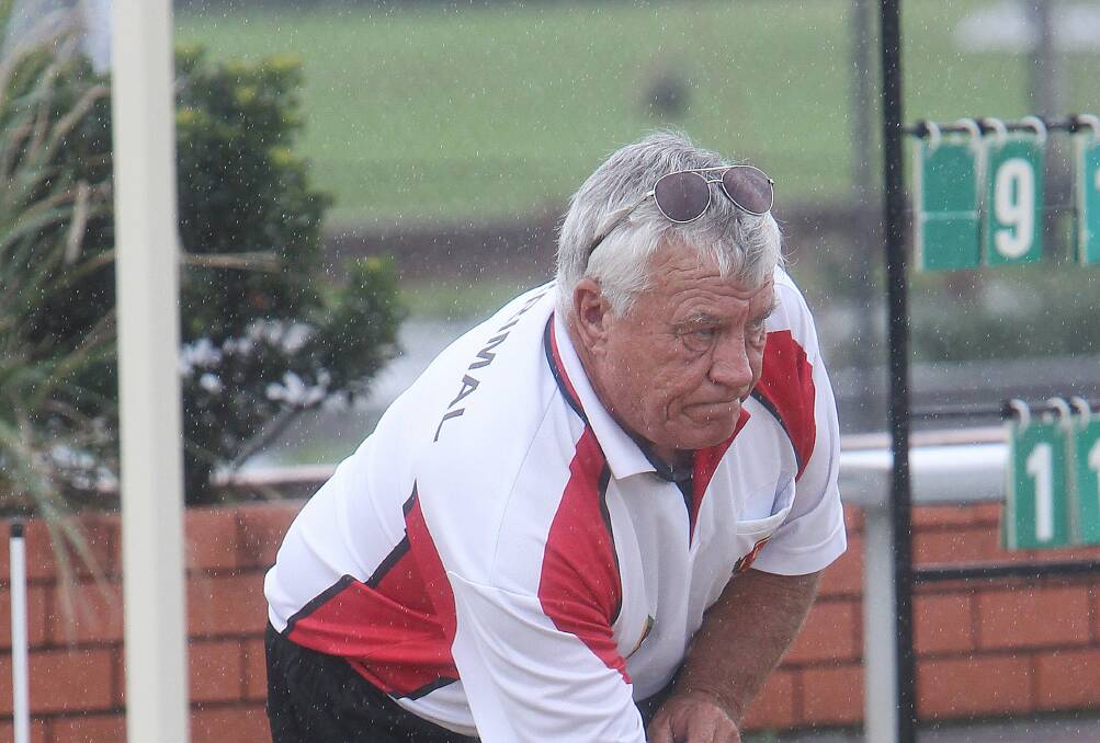 Corrimal’s Jack Forbes plays his bowl during the loss to Towradgi. The defeat leaves Corrimal outside the top four with one match to play.
