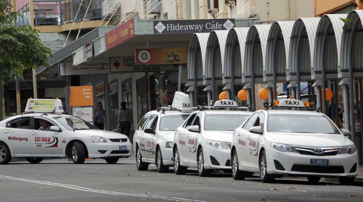 Queuing up: Taxis in Wollongong will be subject to new regulations which will open up the market to other providers. Picture: ANDY ZAKELI