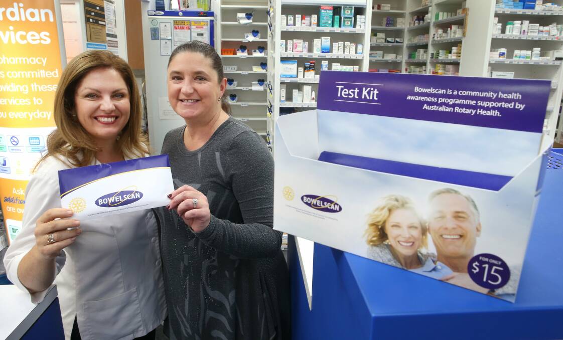 Corrimal pharmacist Ljiljana Cosic and Illawarra Rotary Club member Kate Strosberg encourage people to support the Bowel Scan campaign. Picture: KIRK GILMOUR
