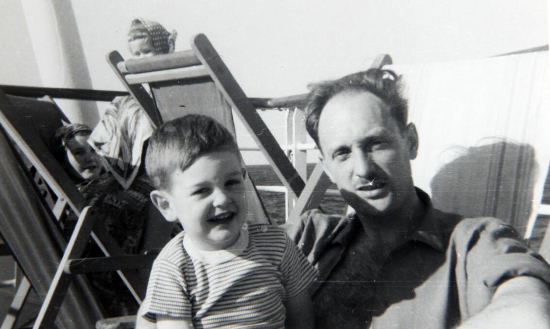 New beginning: Russell Hadley with son Christopher in January 1964 on board the Aurelia passenger liner leaving Britain. Picture: SUPPLIED