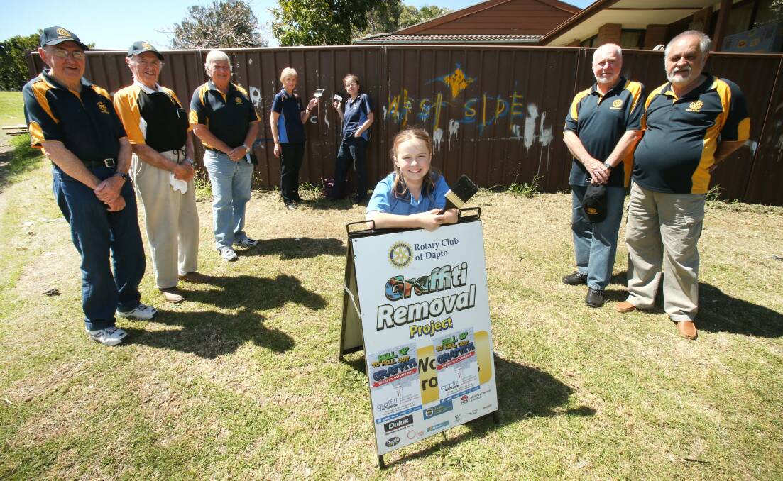Girl Guide Taleah Hubbard and Dapto Rotary Club members. Picture: KIRK GILMOUR