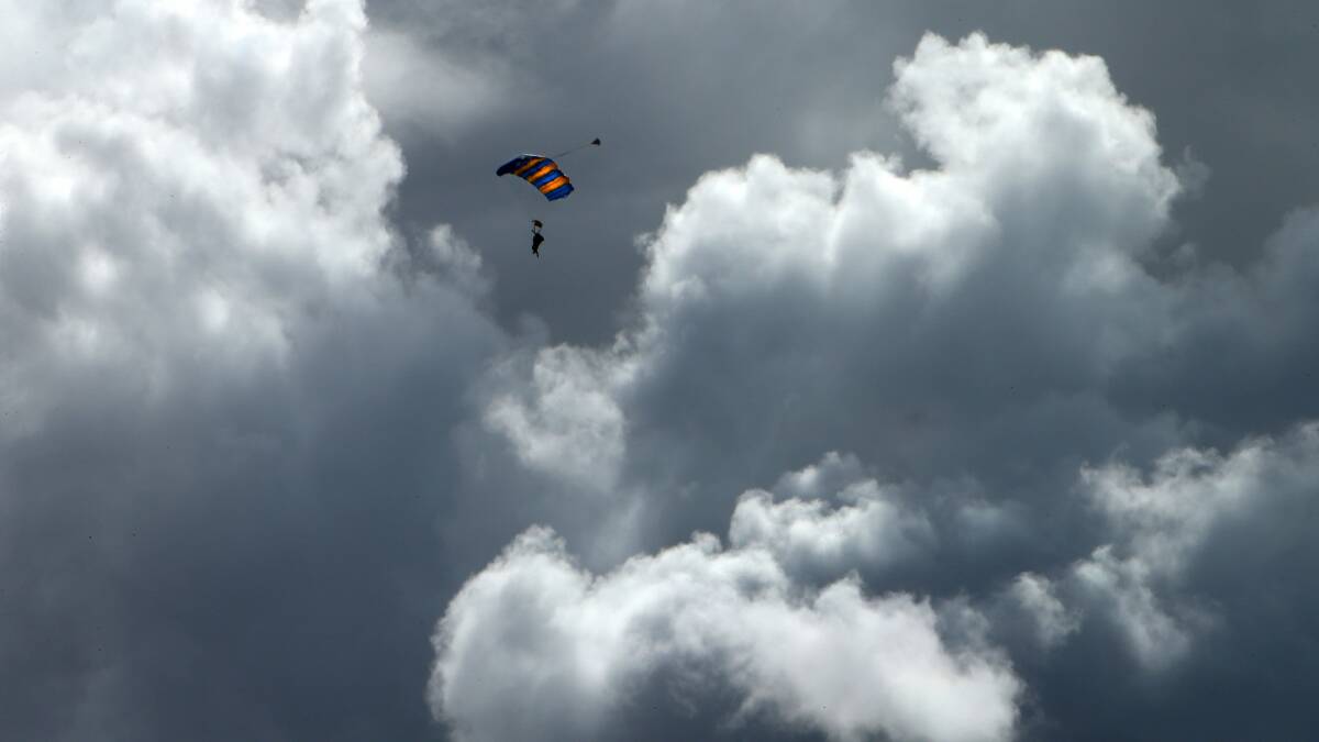 Skydivers near Wollongong Harbour. Picture: KIRK GILMOUR