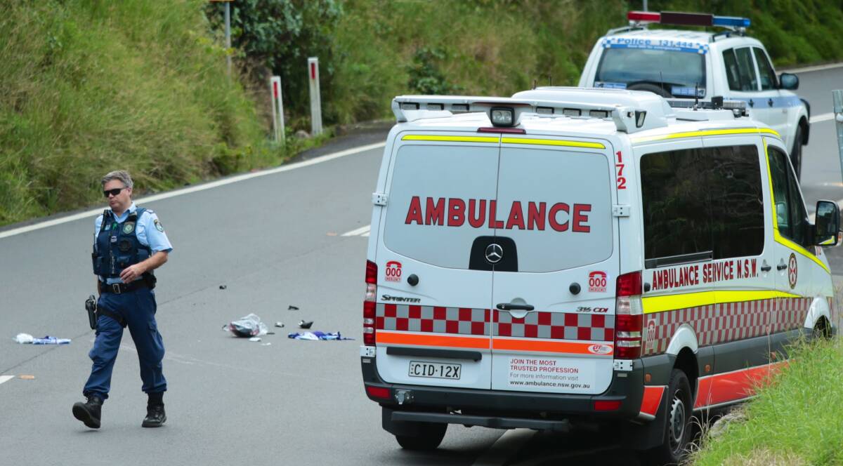 Emergency services at the scene of where a cyclist was hit by a car in Coalcliff on Friday. Picture: ADAM McLEAN