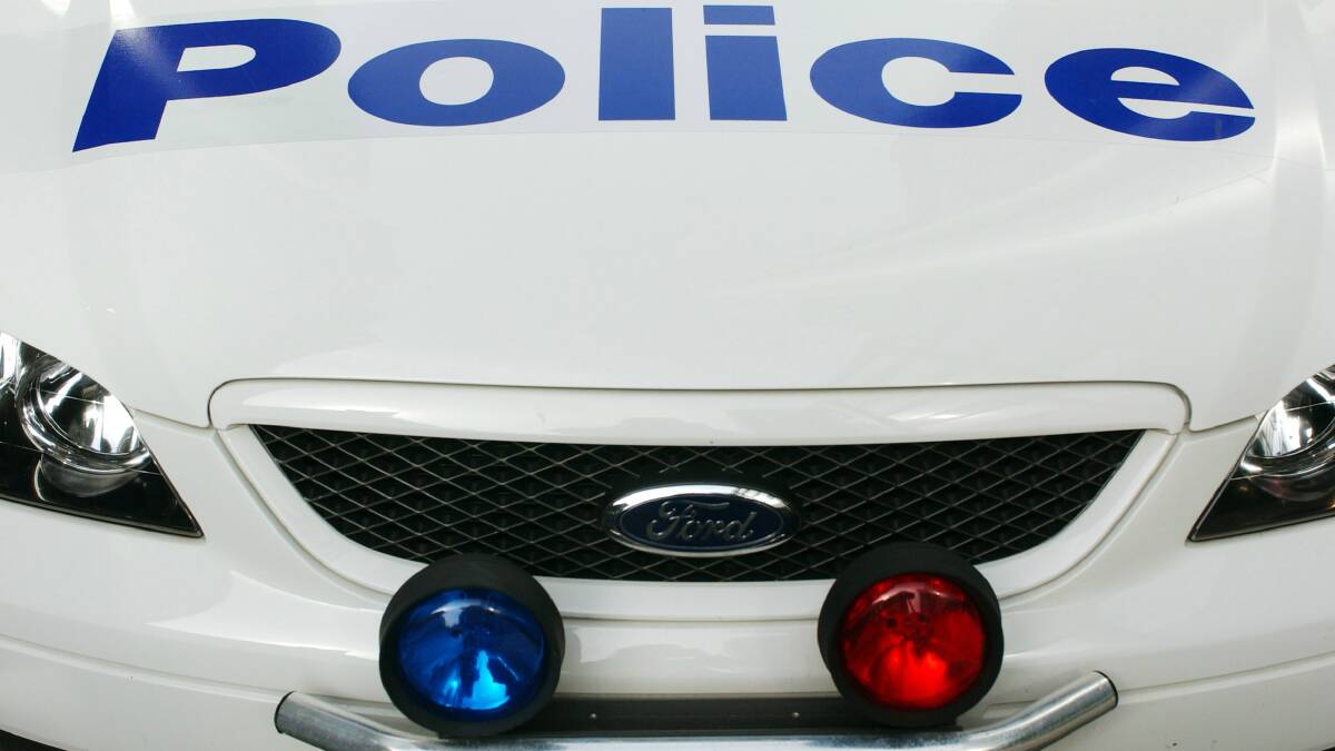 Man charged with assaulting Wollongong police
