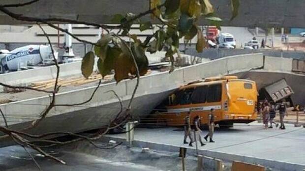 Bus crushed under collapsed overpass in Brazil. Photo: Belo Horizonte police handout via Twitter.