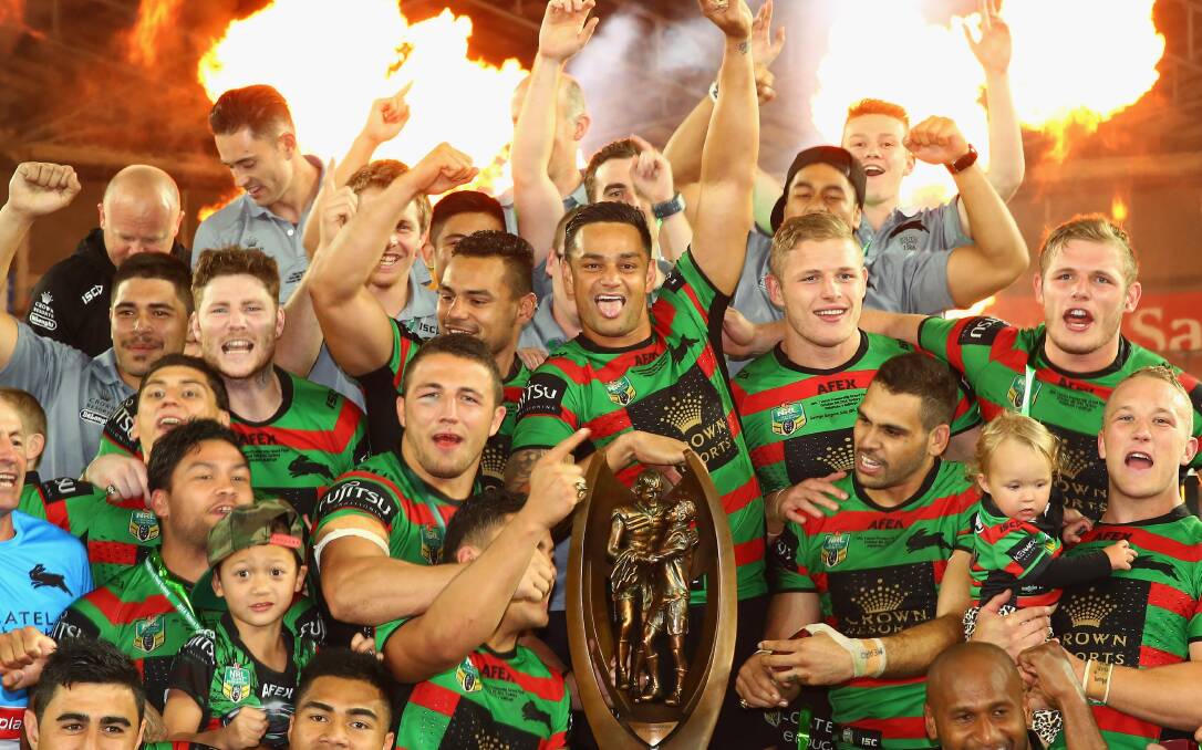 The Rabbitohs celebrate victory during the 2014 NRL Grand Final match. Picture: GETTY IMAGES