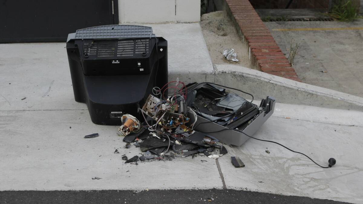 A television was destroyed near the JB Hi-Fi loading dock on Sunday. Picture: ANDY ZAKELI