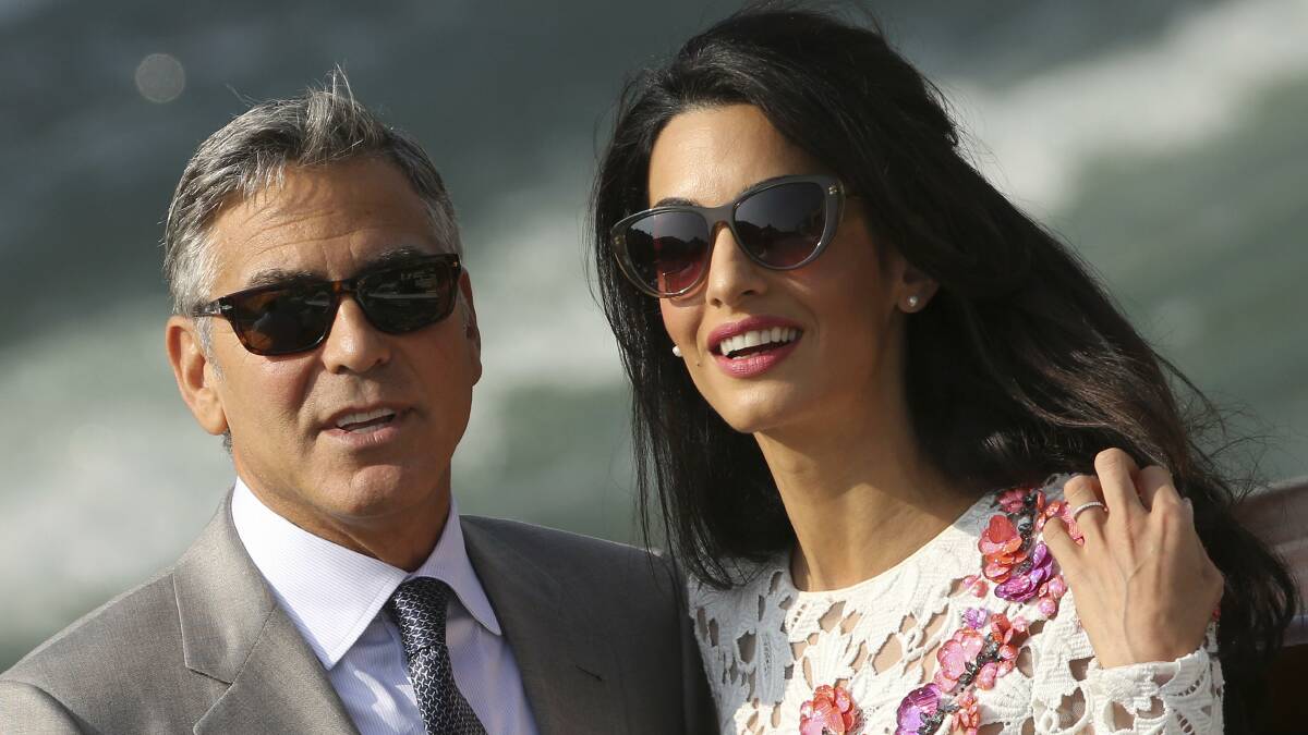 George Clooney and his wife Amal Alamuddin. Picture: REUTERS
